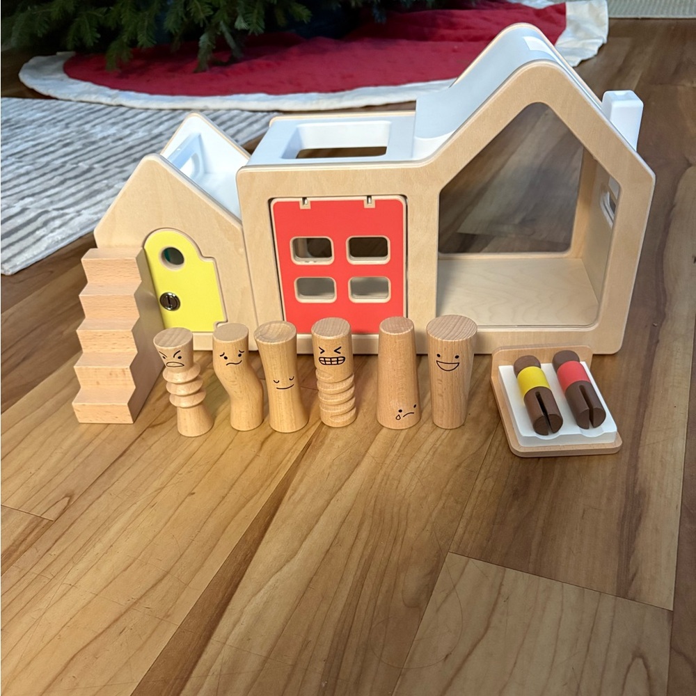 Lovevery house with emotion pegs